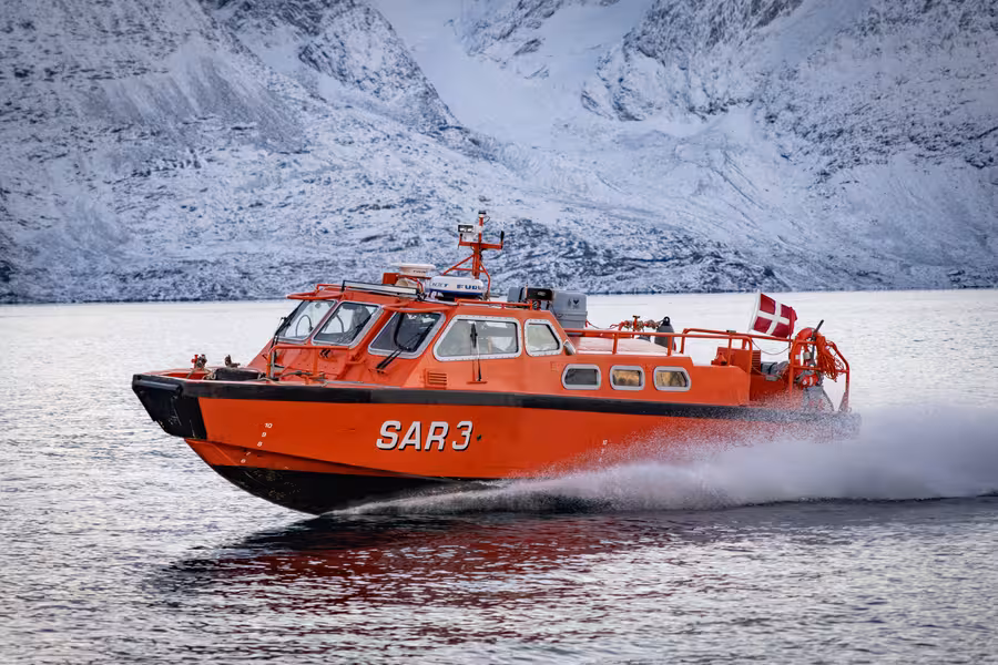 Search and Rescue Vessel, Qoornoq, Greenland, sailing at high speed during exercise.